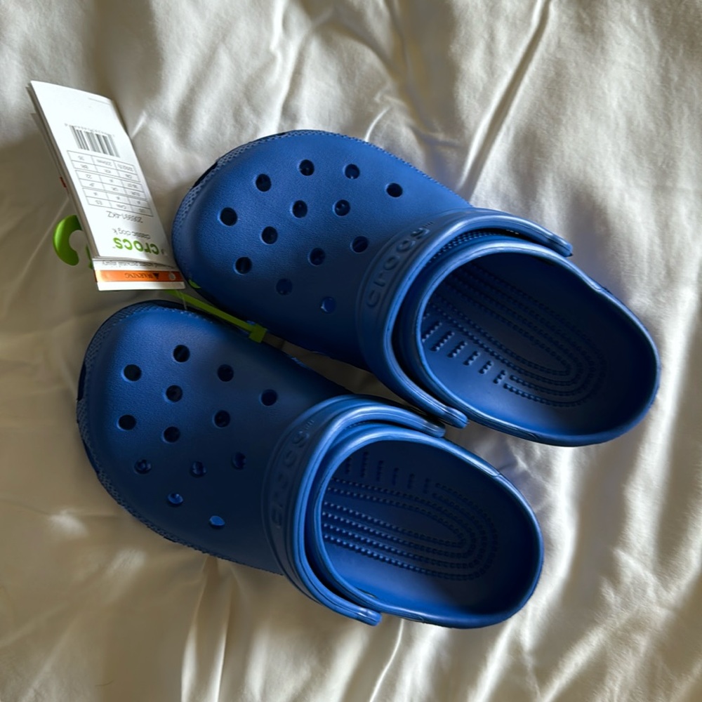 Crocs,  classic clog, kids size 4, Blue Bolt. NWT, never worn